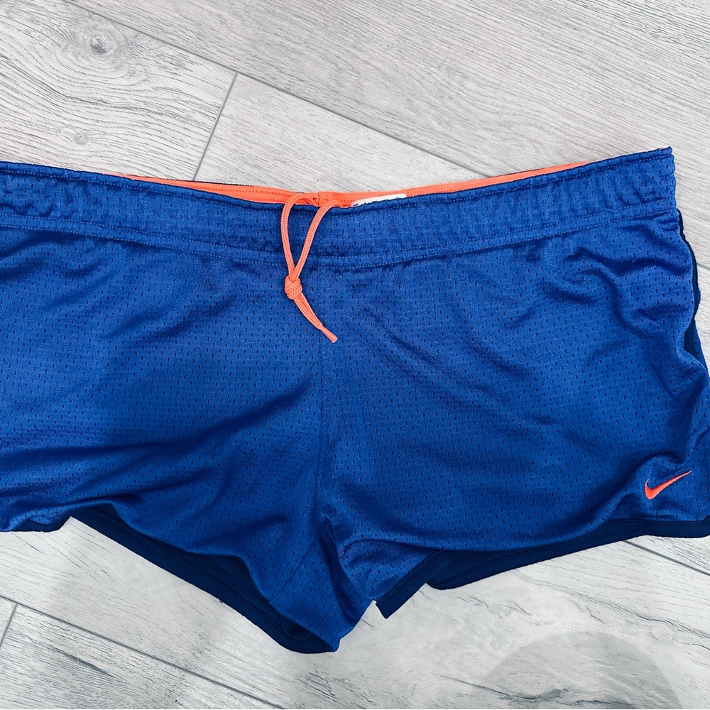 Nike Dri-FIT Navy Shorts with Vibrant Orange Trim